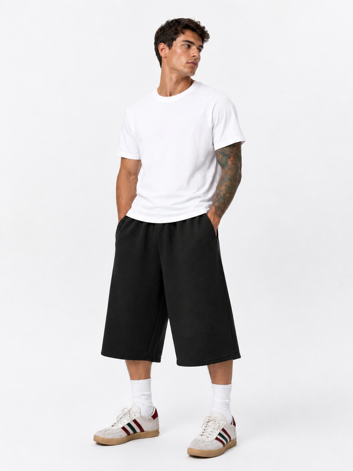 Relaxed Cropped Wide-Leg Trousers — Black