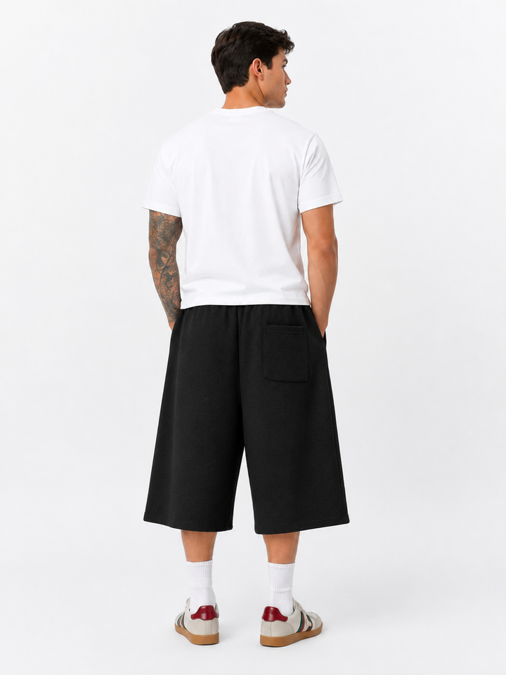 Relaxed Cropped Wide-Leg Trousers — Black